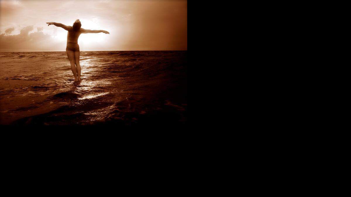 
Portrait of Pioneer Winter dancing on water.

