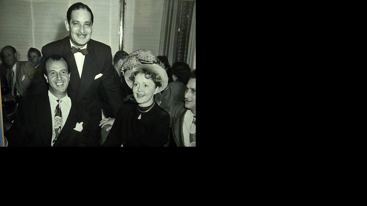 
Herbert Abrams’ father Irwin Abrams (standing) with guests at the hotel in 1950.
