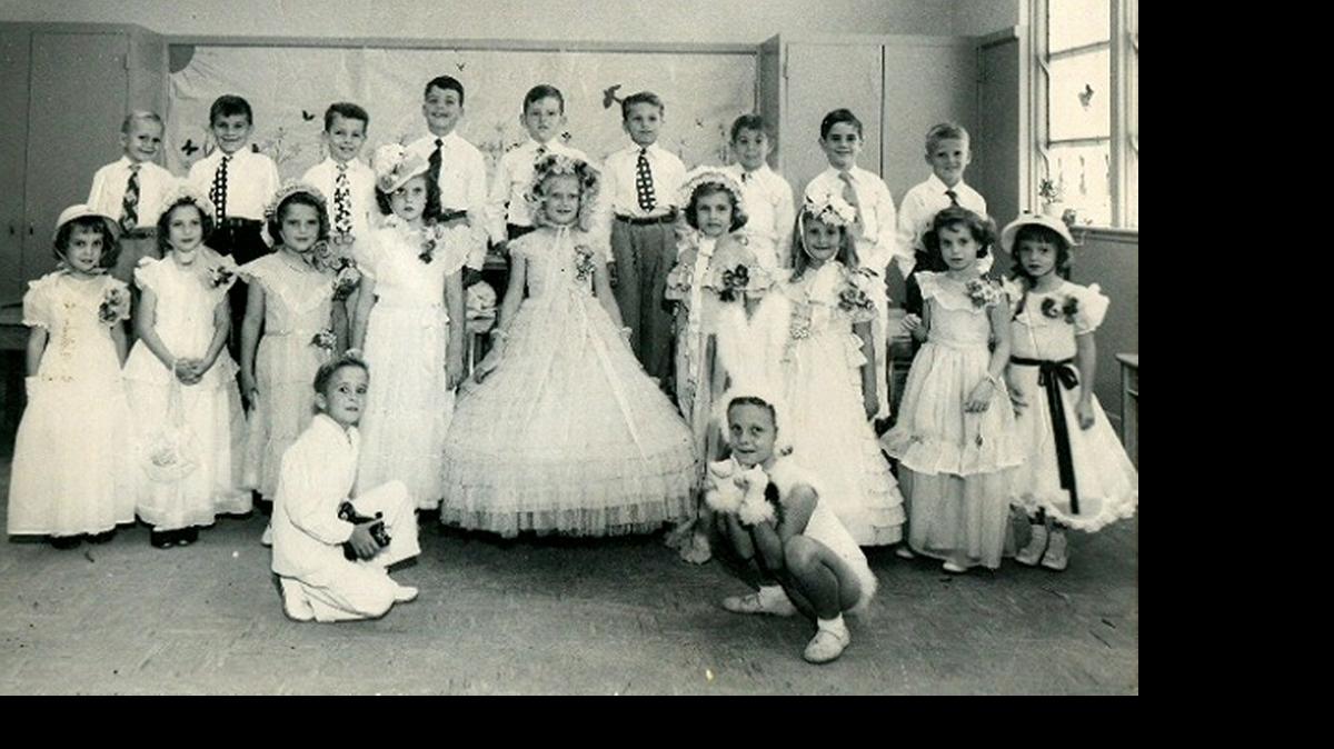 
The Easter Parade in the First Grade Class at Miami Shores Elementary School. Joyce Ojala is in the center with the hoop skirt. 

