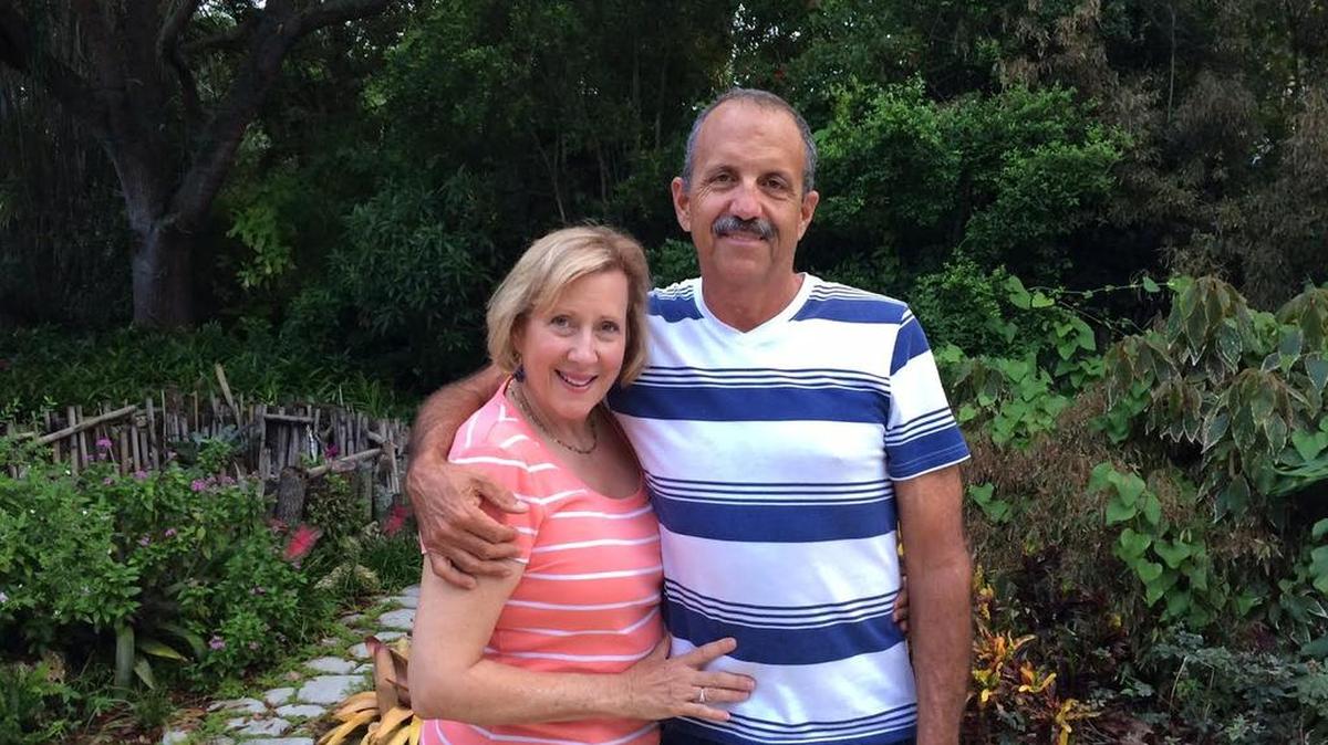 
Robert and Sherry Boberman in their backyard in Kendall. 
