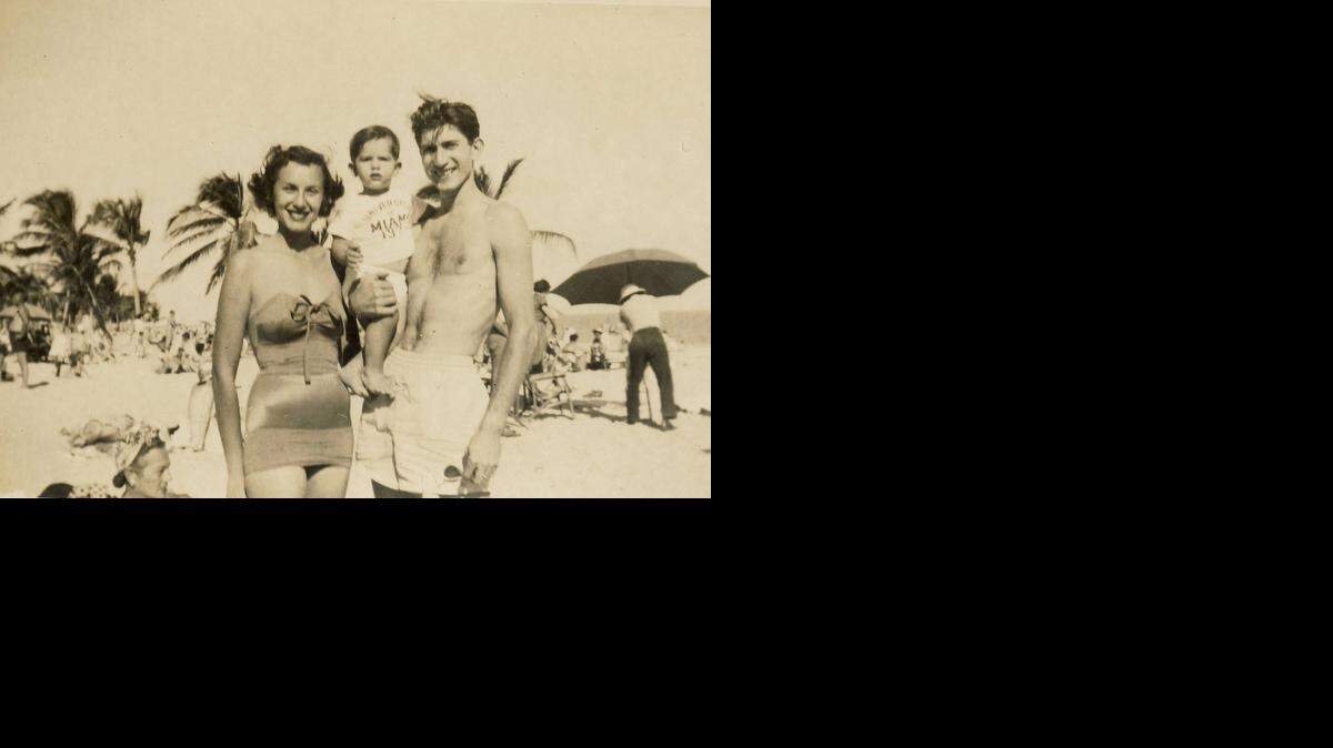 
Mark Kuperman as a baby with his parents and grandmother (seated) on South Beach in 1950.
