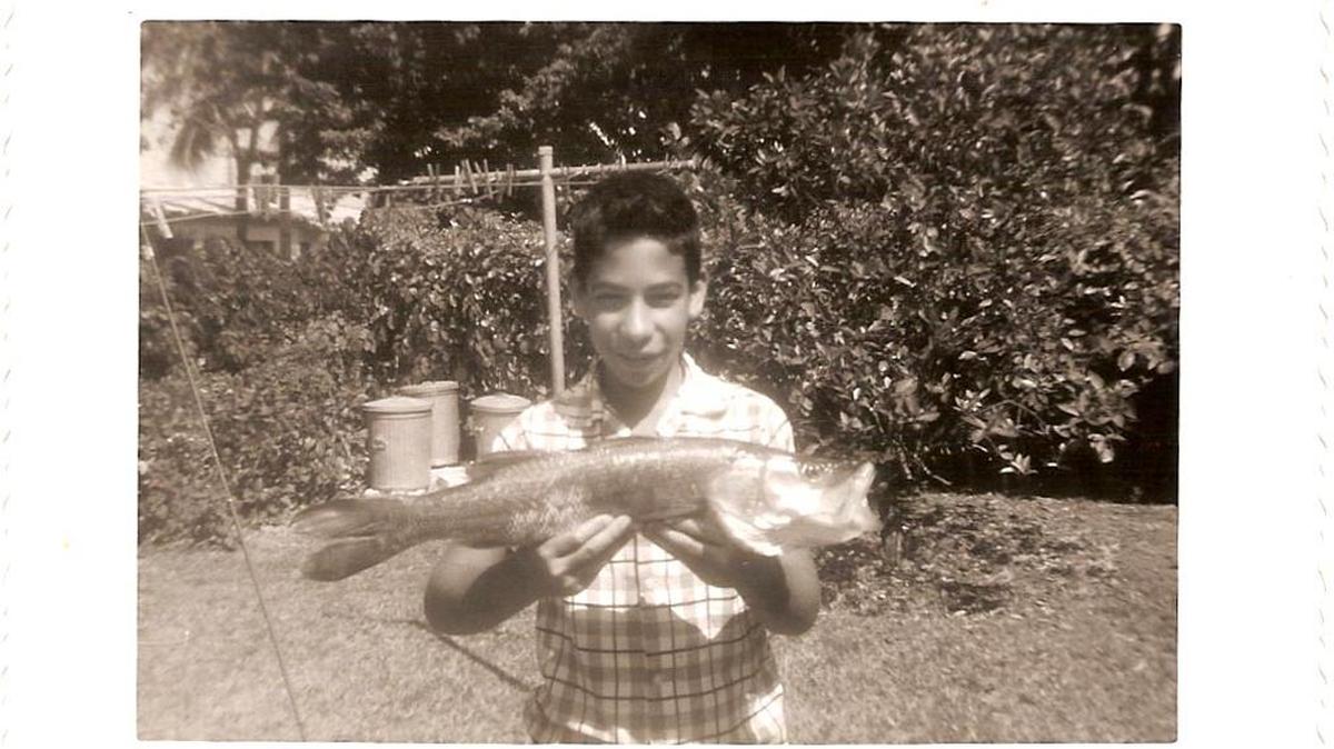
George Detrio shows off his first Snook at the age of 14.
