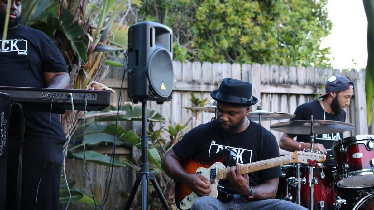 Hubert Phanord, Aaron Marcus Payne and Larren Mellerson of the band Elements warm-up before their session at BLCK Family's August event.