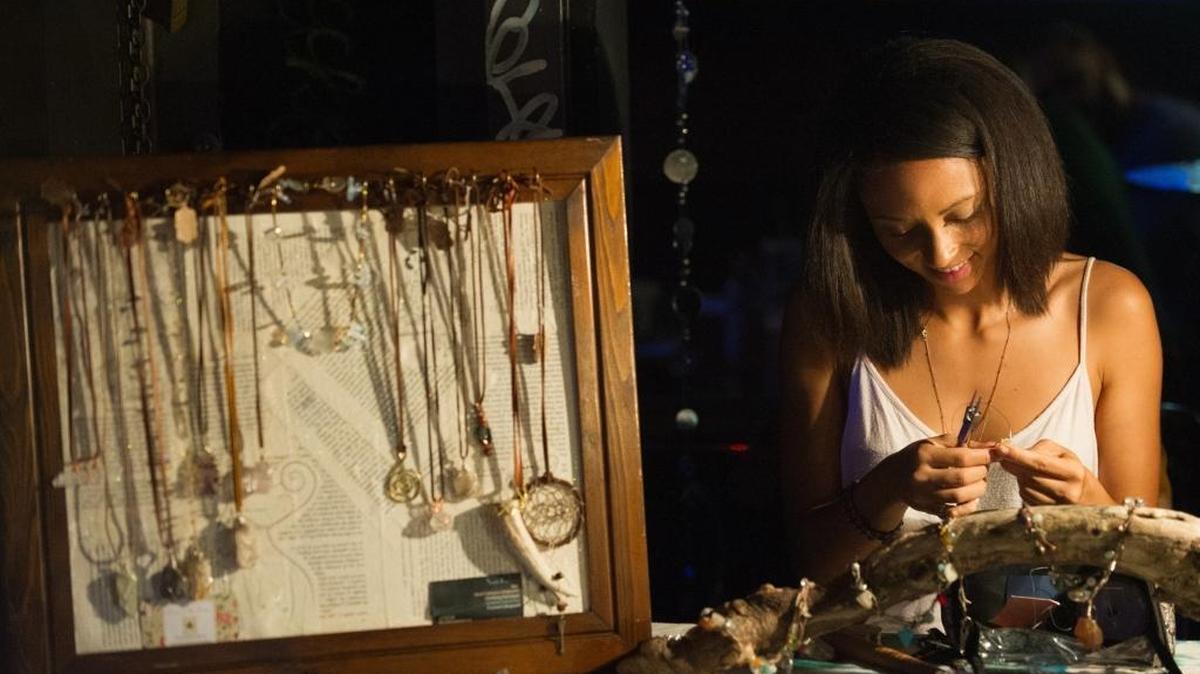 
Sam Richey, an artist from Fort Lauderdale, works on jewelry during Blend The Femme at The Social Lubricant in Wynwood, Saturday, Sept. 26, 2015.
