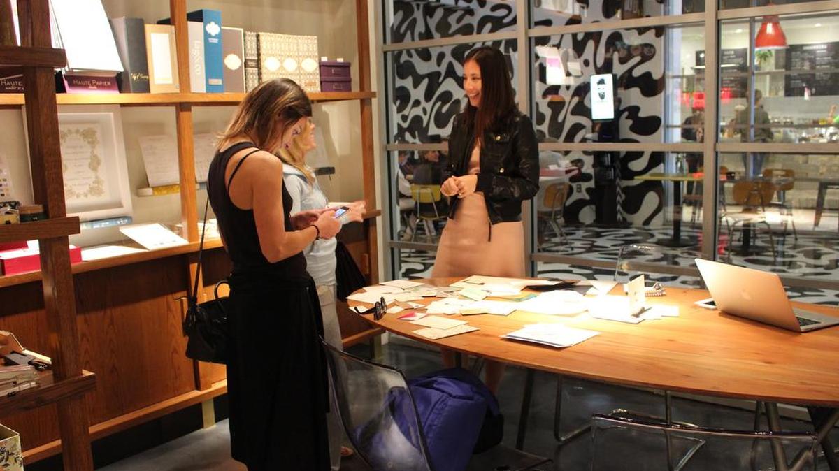 Shop owner Bridget Dadd speaking to shoppers at Wynwood Letterpress on Jan.14