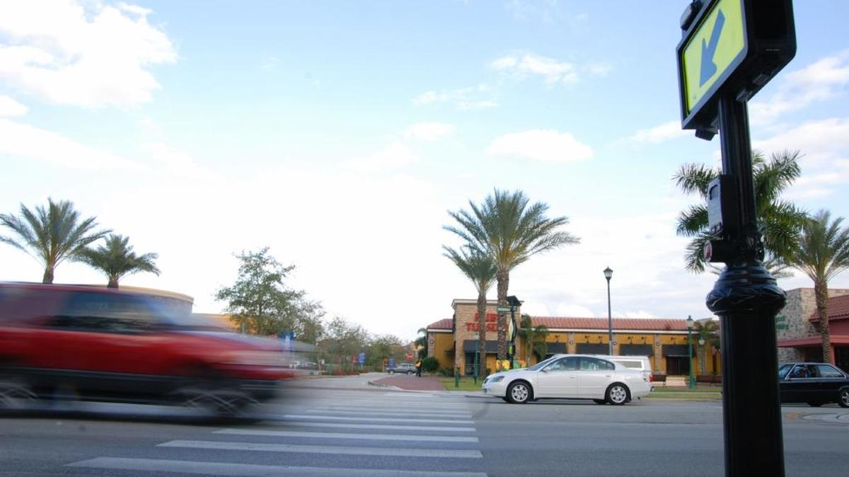 A pedestrian crosswalk installed in 2009 at the intersection of Ludlam Road and Main Street in Miami Lakes.