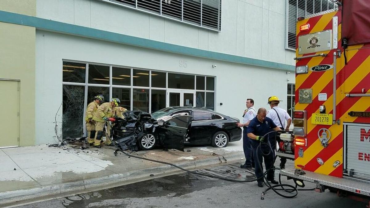 A car smashed into the side of Miami Arts Charter School early Thursday morning.