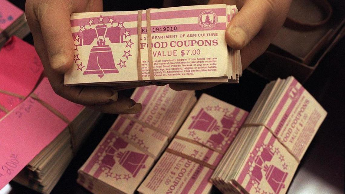 The Justice Department charged 12 South Floridians with fraud after, prosecutors allege, they ripped off $20 million through a basic food stamp fraud scheme run out of stores in Miami and Broward counties.