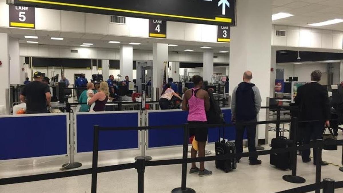 Lines were moving Tuesday morning at Miami International Airport.