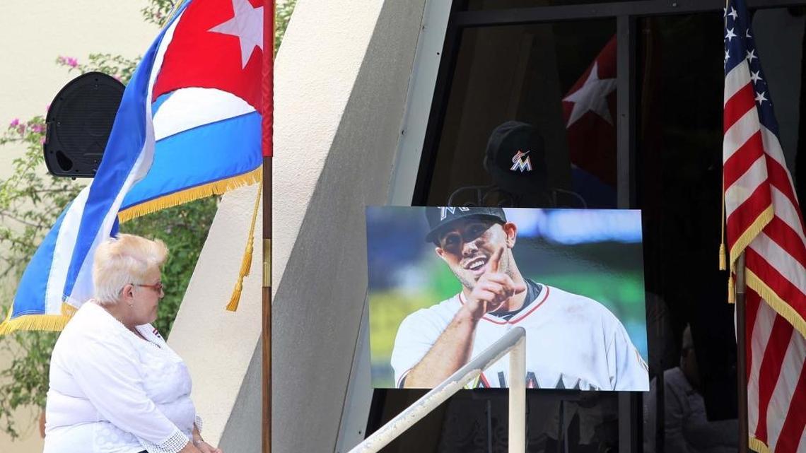 Sandy Tejeiro gazes at a portrait of Jose Fernandez at a memorial service at la Ermita de la Caridad on Sept. 28.