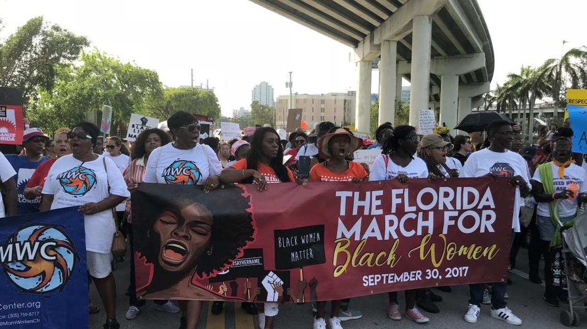 Hundreds of people joined the Florida March for Black Women Saturday afternoon outside Booker T. Washington Senior High School in Overtown, Miami.