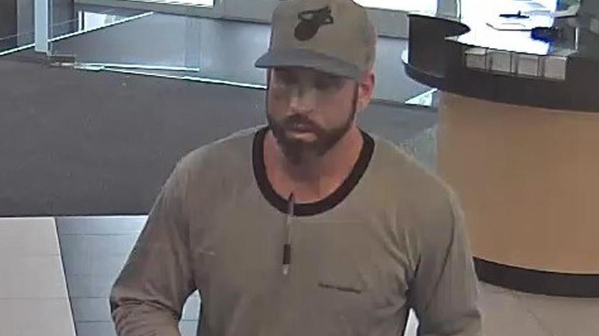 An image captured by security camera footage of a man the FBI suspects robbed two South Florida Banks.
