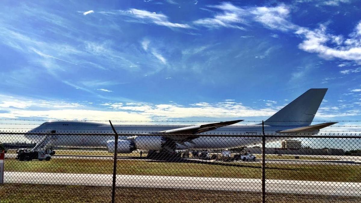 Atlas air cargo 747 having tire replaced after emergency landing at MIA.