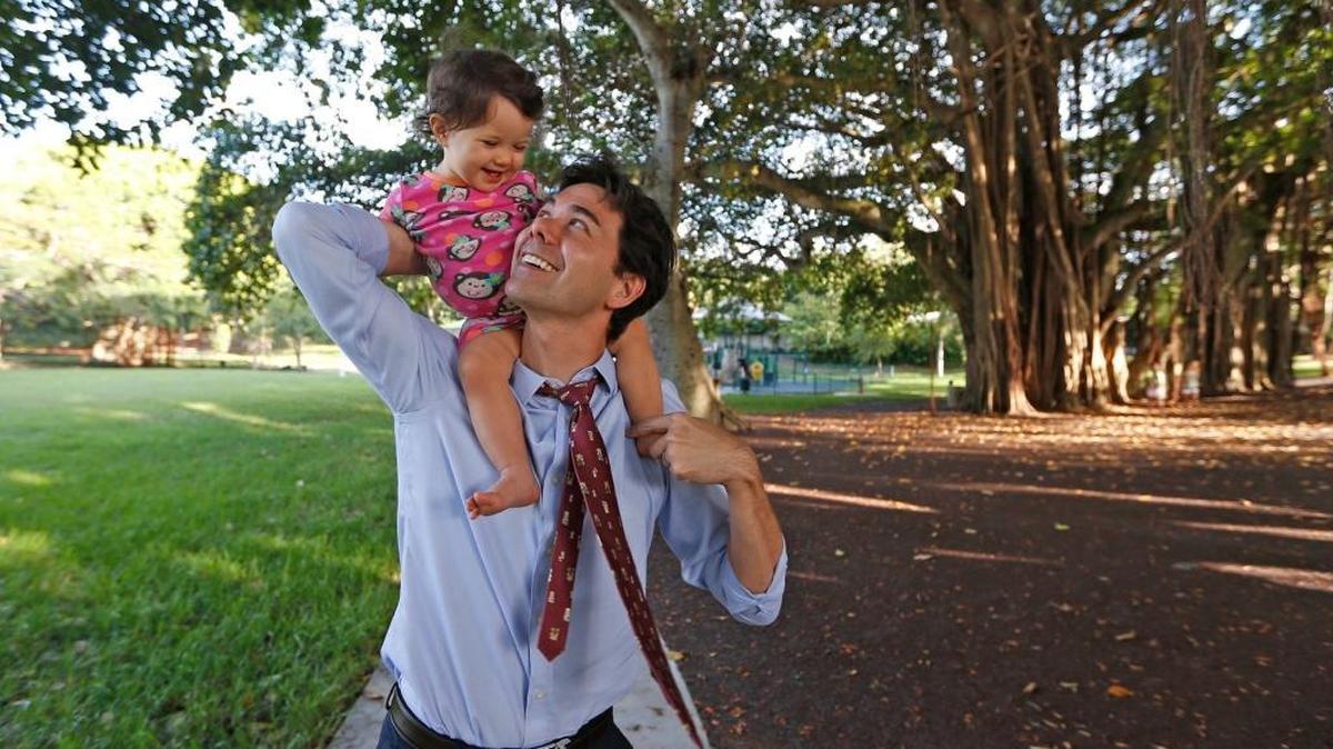 Ken Russell with his daughter Eva Russell, 1, at Merrie Christmas Park.