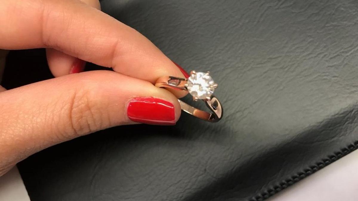 Miami International Airport is hoping to reunite a found engagement ring, pictured here, with its rightful owner.