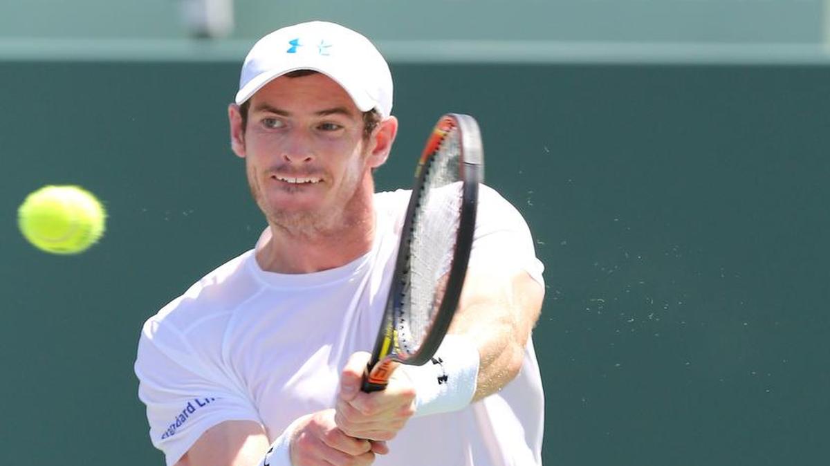 
Andy Murray returns to Novak Djokovic during the men's final at Miami Open tennis tournament at Crandon Park in Key Biscayne on Sunday, April 5, 2015. Djokovic won 7 (7)-6(3), 4-6, 6-0.
