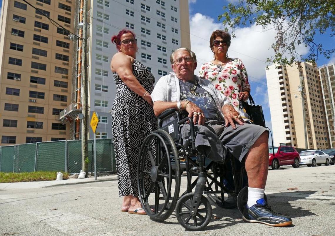 From L-R, Olga Vicente, 58, Marciel Peña, 84 and Giralda Perez Molina, 54 reside inside the construction zone at their home inside of Civic Towers (1400 NW 19th St.) in Allapattah. A gut renovation of two affordable senior towers conducted with public financial assistance, has ground to a halt. Dozens of families are living in a construction zone, waiting for some progress.