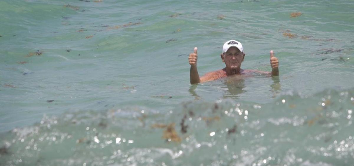 Manfred Gerber, then 89, enjoyed the surf at Haulover Beach in July 2017, after a shark bit a nude swimmer on the legs.
