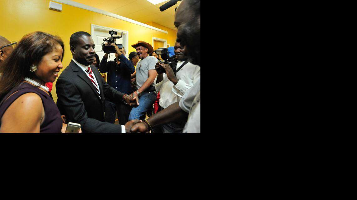 
Dr. Smith Joseph, candidate for mayor of North Miami, greets supporters at his campaign headquarters in North Miami, Tuesday, Nov. 4, 2014.
