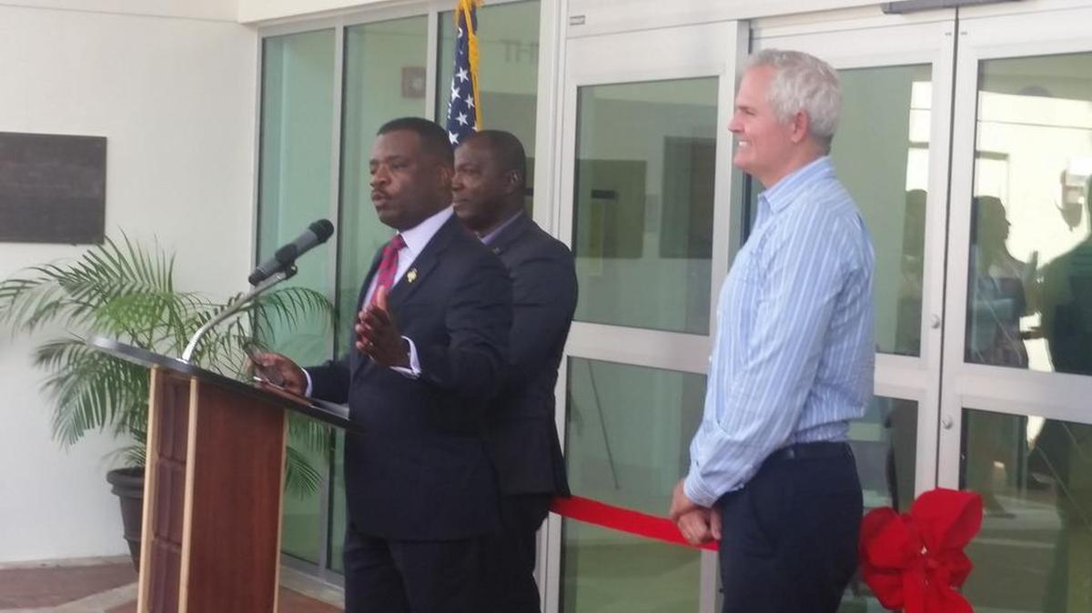 North Miami Mayor Smith Joseph addresses a crowd at the North Miami Public Library reopening in November 2015. Also pictured are council members Philippe Bien-Aime, back left, and Scott Galvin.