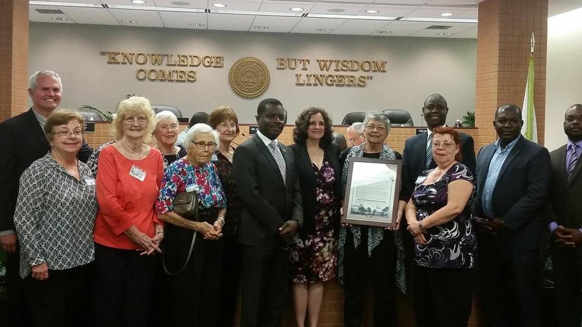 North Miami officials pose with members of the Greater North Miami Historical Society. The city honored them as they celebrate North Miami’s 90th anniversary.