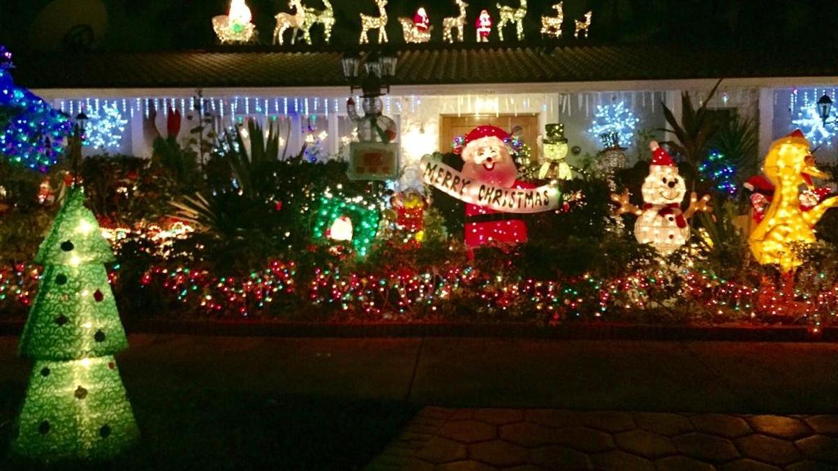 Anibel Costanso decorates his Highland Lakes home with a bright display of light and lawn figures each Christmas season.