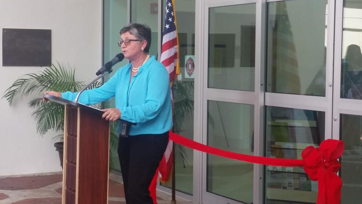 Library director Lucia Gonzalez addresses the crowd at the reopening ceremony for the North Miami Public Library in November 2015.