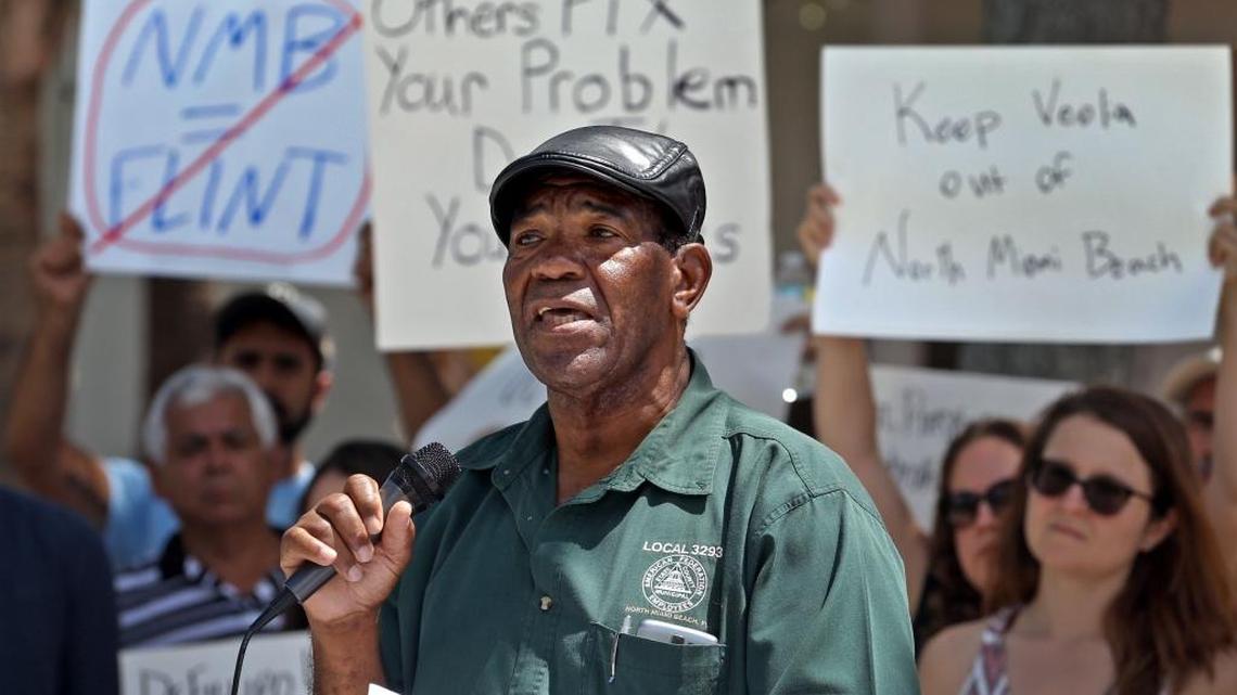 Retired water department employee Hupert Rose addresses other residents as they gather in front of City Hall on Thursday, March 30, 2017, to protest in advance of a North Miami Beach City Commission vote to outsource the city’s water utility to private corporations.
