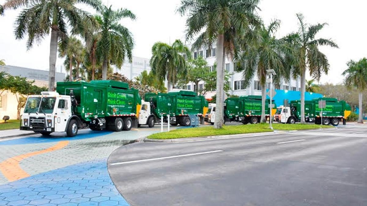 Four new compressed natural gas trucks will provide greener services to the city.