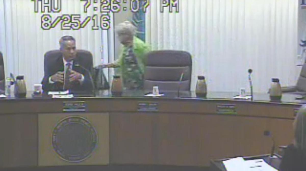 Councilwoman Phyllis Smith exits the Aug. 25 North Miami Beach special council meeting. The city is considering an ordinance that would make leaving before the end of a meeting a violation, except in emergency situations.