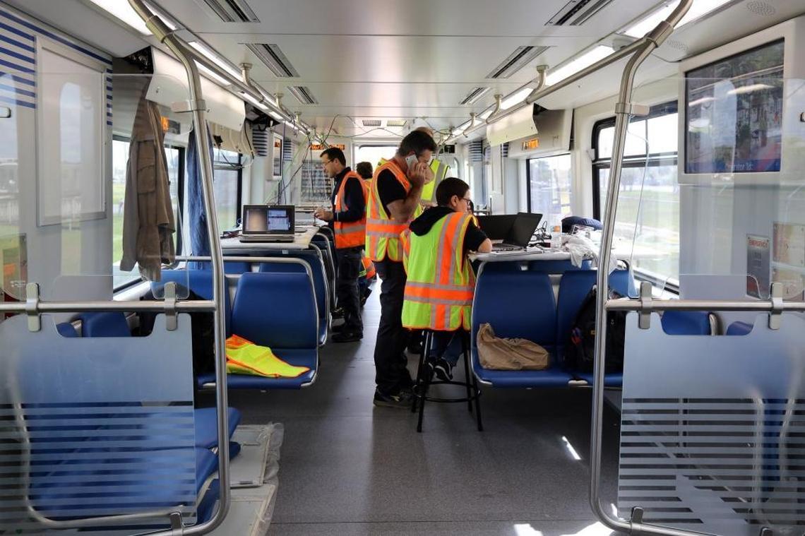 Workers test one of the first new Metrorail cars that soon will be on the rails for commuters to ride. Some of the improvements on the new train cars are improved A/C, Wi-Fi, more comfortable (and graffiti-proof) seats, bicycle racks and security cameras.