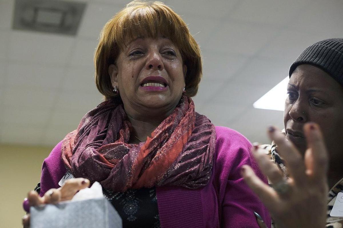 Milagros Giménez (L) and Sonya (R) share tales of their own experience with sexual abuse as part of the Women’s Circle gathering at the Miami Workers Center.