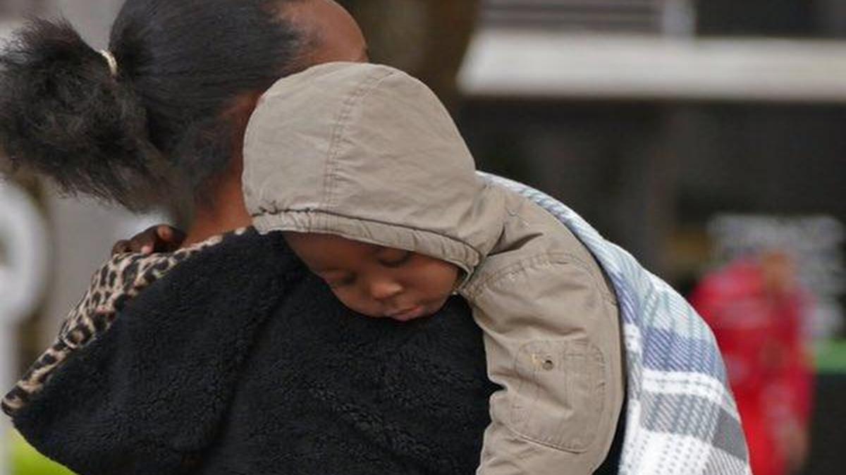 South Florida bundled up Tuesday as temperatures dipped to the mid-50s in downtown Miami.
