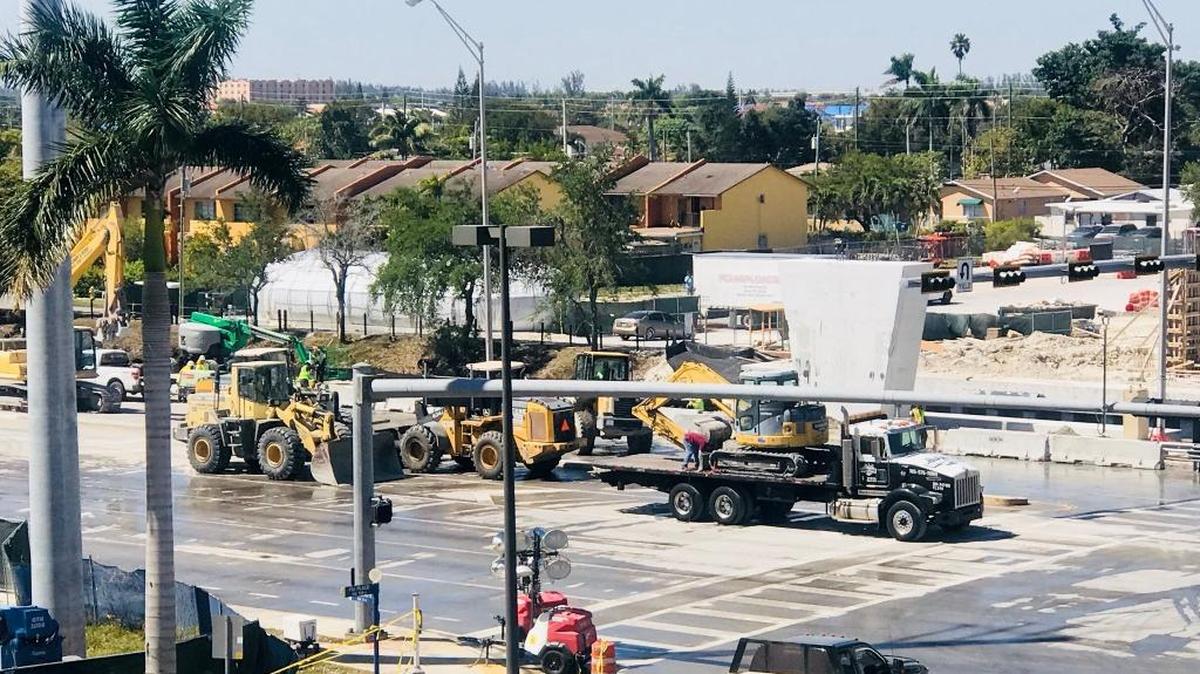 Southwest Eighth Street reopened Saturday morning after being closed for more than a week.