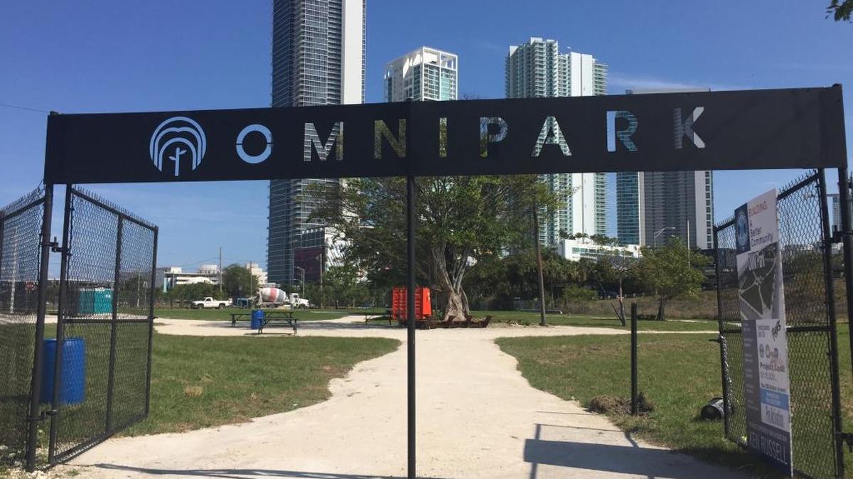Work is still under way at Omni Park, but the seven-acre green space opens Friday to the public.