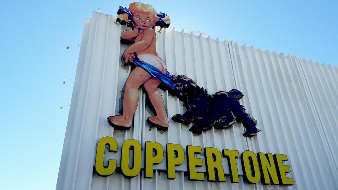 The Coppertone Cutie has been repaired after Hurricane Irma knocked part of her head off. In addition, the sign has had a face-lift to remove an unsightly seam near her nose.