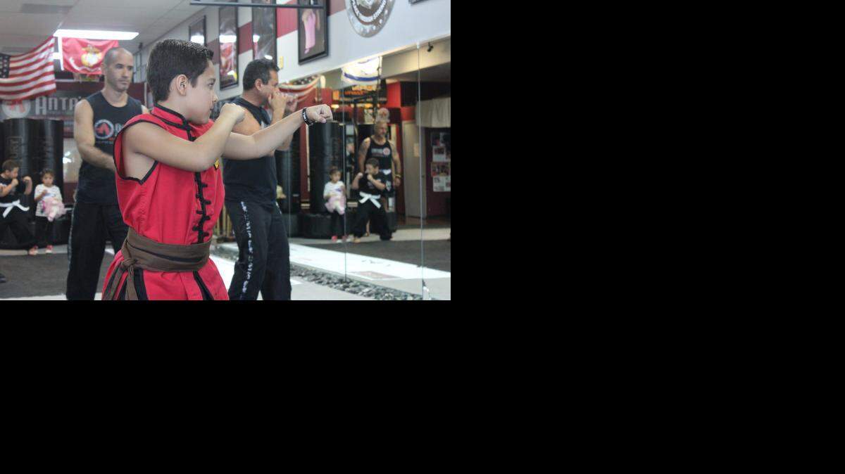 
Diego Ordonez, 9, practicing his martial arts during the Annual Back to School Bash on Sept. 5 at Anta's Fitness and Self Defense in Doral.
