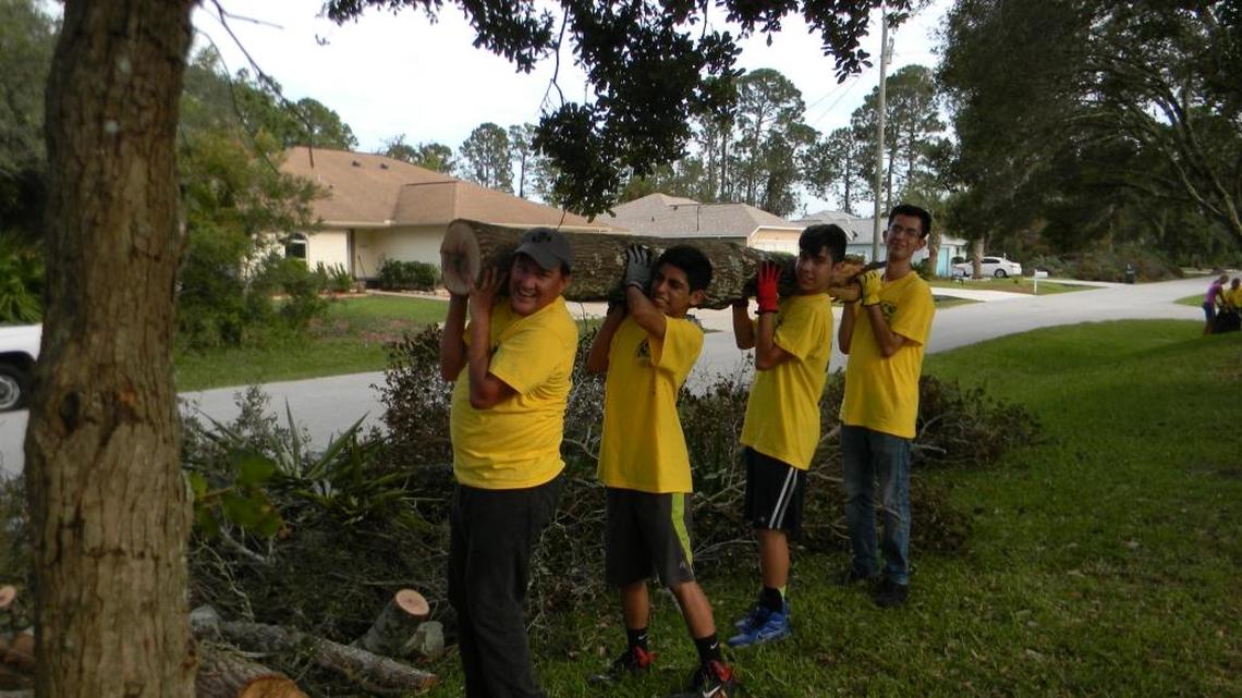 Gleen Rivas, Alejo Nuñez, Dylan Nuñez, Scott Castillo are among the volunteers from The Church of Jesus Christ of Latter-day Saints who traveled to Bunnell, Florida, to help with cleanup after Hurricane Matthew.