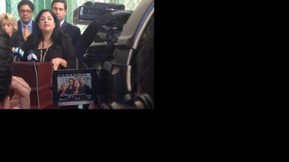 
Bertila Soto, chief judge in Miami-Dade County, addresses reporters outside the county’s main courthouse on Thursday. Moving clockwise from her right, she’s flanked by Judge Marisa Tinkler Menendez, lobbyist and lawyer Jorge Luis Lopez, and Ray Abadin, incoming president of the Florida Bar.
