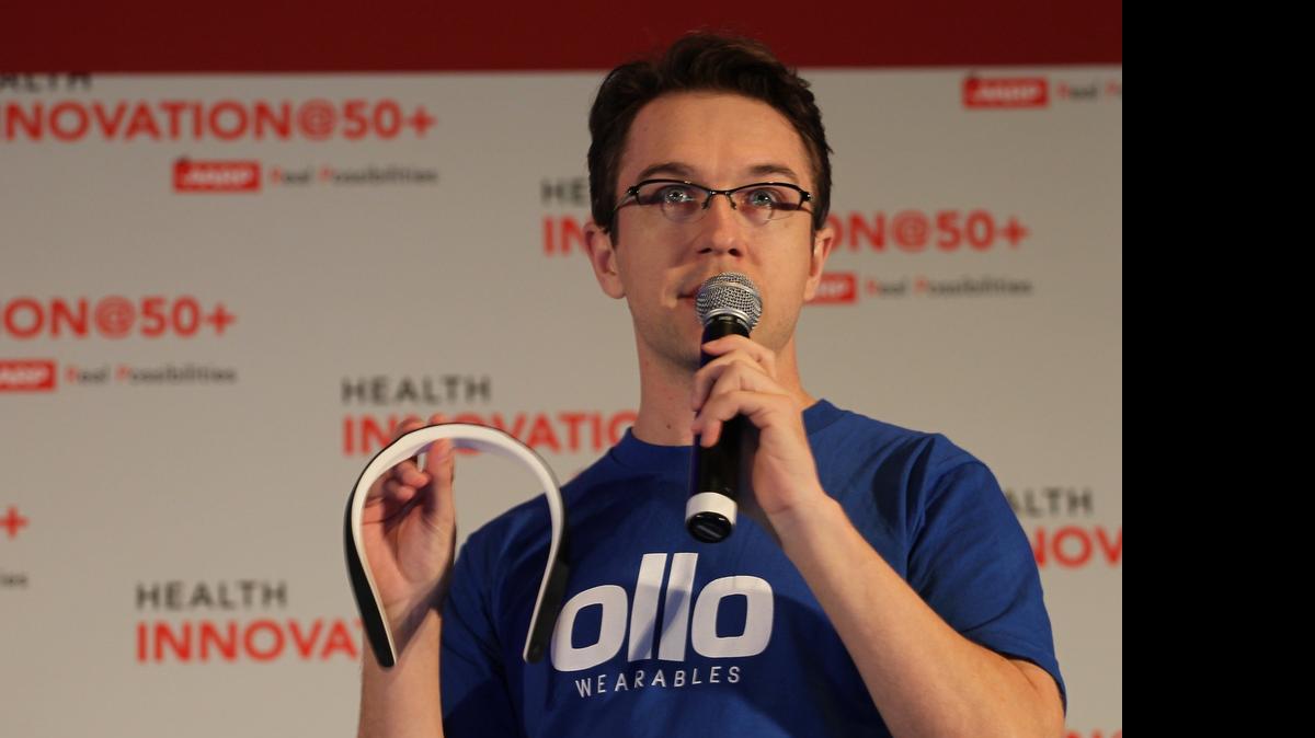 
Hugh Geiger, CEO of Ollo, a wearable device that allows users to interface with digital social media platform, competes against other health tech startups during the AARP Health Innovation50+ LivePitch, part of a three-day expo in Miami Beach, on Thursday, May 14, 2015.
