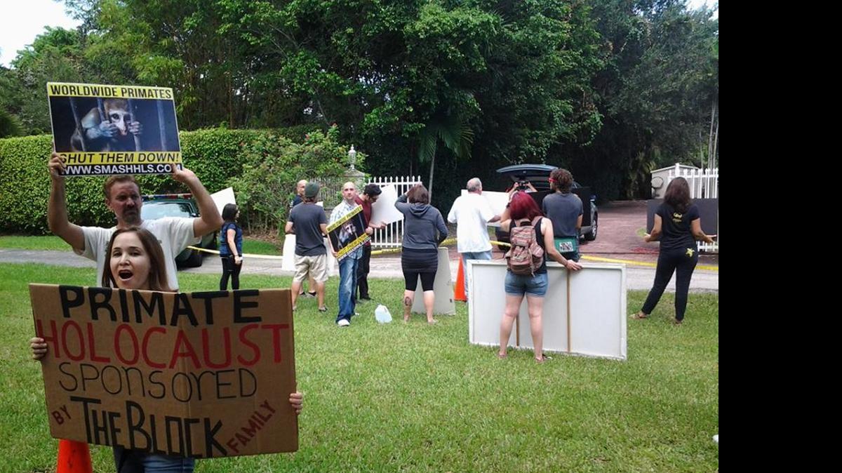 
Activists in 2013 protest outside the Pinecrest home of Matt and Brooke Block, who own Worldwide Primates, one of the largest importers of monkeys for research and testing in the United States.

