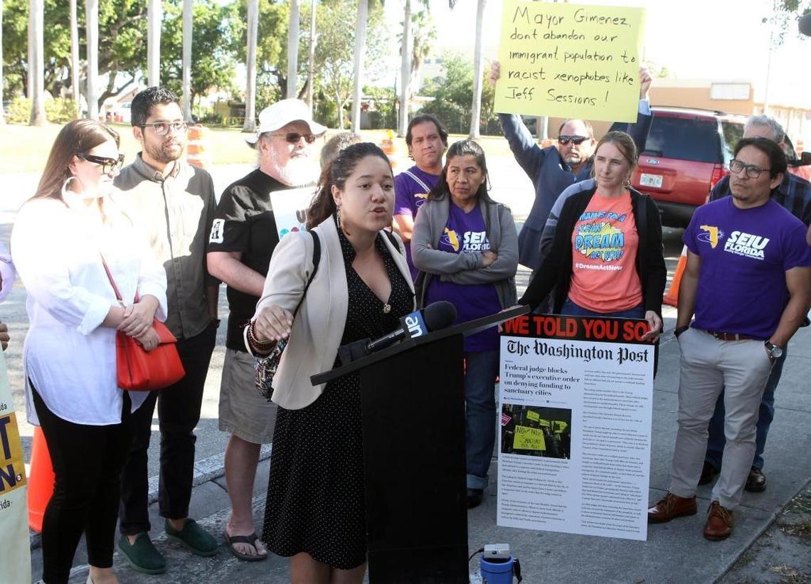 Immigration activist Yuleidy Cristina Gonzalez-Nieto joined a small group criticizing Miami-Dade Mayor Carlos Gimenez on immigration during a press conference in front of the Miami-Dade County Auditorium, where Gimenez was giving his state of the county speech, on Tuesday, Jan. 30, 2018.
