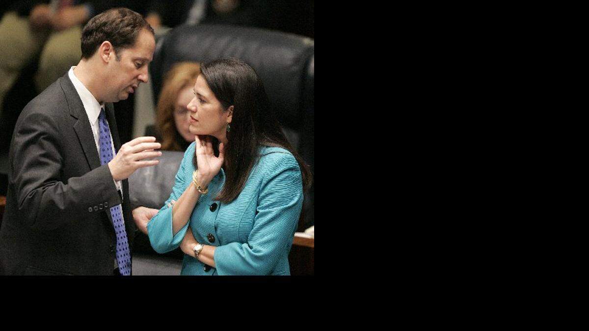 
Sen. Anitere Flores, R-Miami confers with Sen. Joe Negron, R-Stuart, during the 2013 session.
