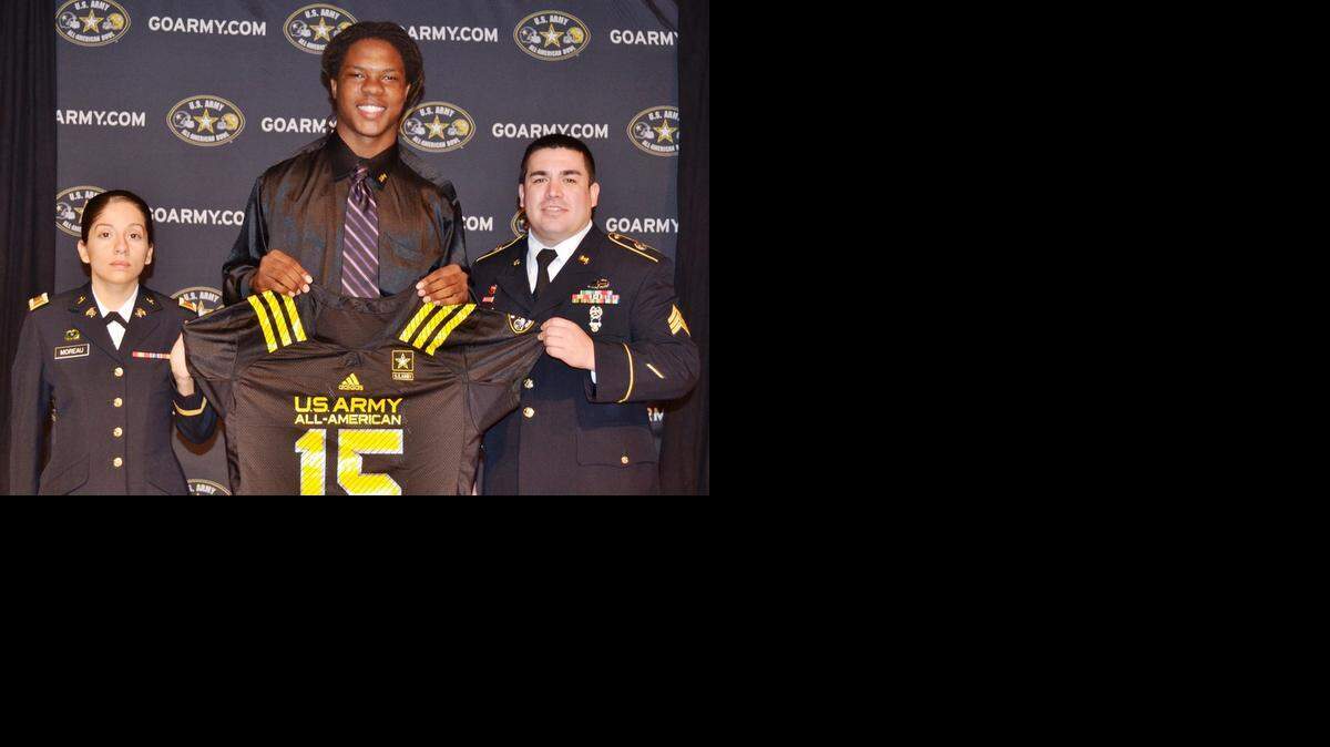 
The 2015 U.S. Army All-American Bowl Selection Tour visited Booker T. Washington High School to select tight end Devonaire Clarington for the 2015 U.S. Army All-American Bowl. Pictured with Clarington are Army representatives Second Lieutenant Yarelys Moreau (left) and Sergeant Adam Alvarez.
