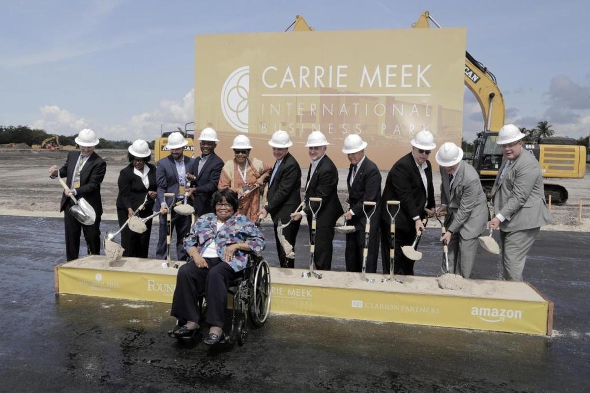 Carrie Meek in front of dignitaries during the groundbreaking ceremony for the Carrie Meek Foundation’s new Amazon warehouse at Opa-locka airport.