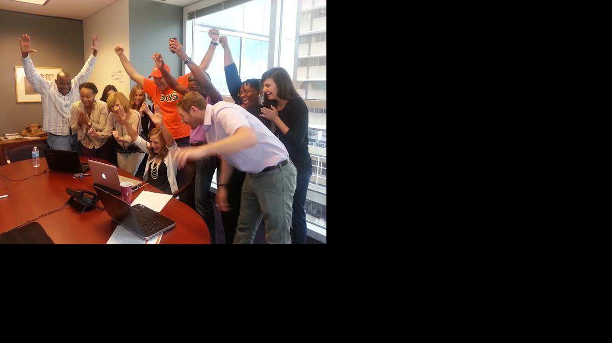 
The Miami Foundation staff celebrates last year after reaching the $1 million milestone on Give Miami Day 2013. This years 24-hour giving period begins at midnight Thursday.
