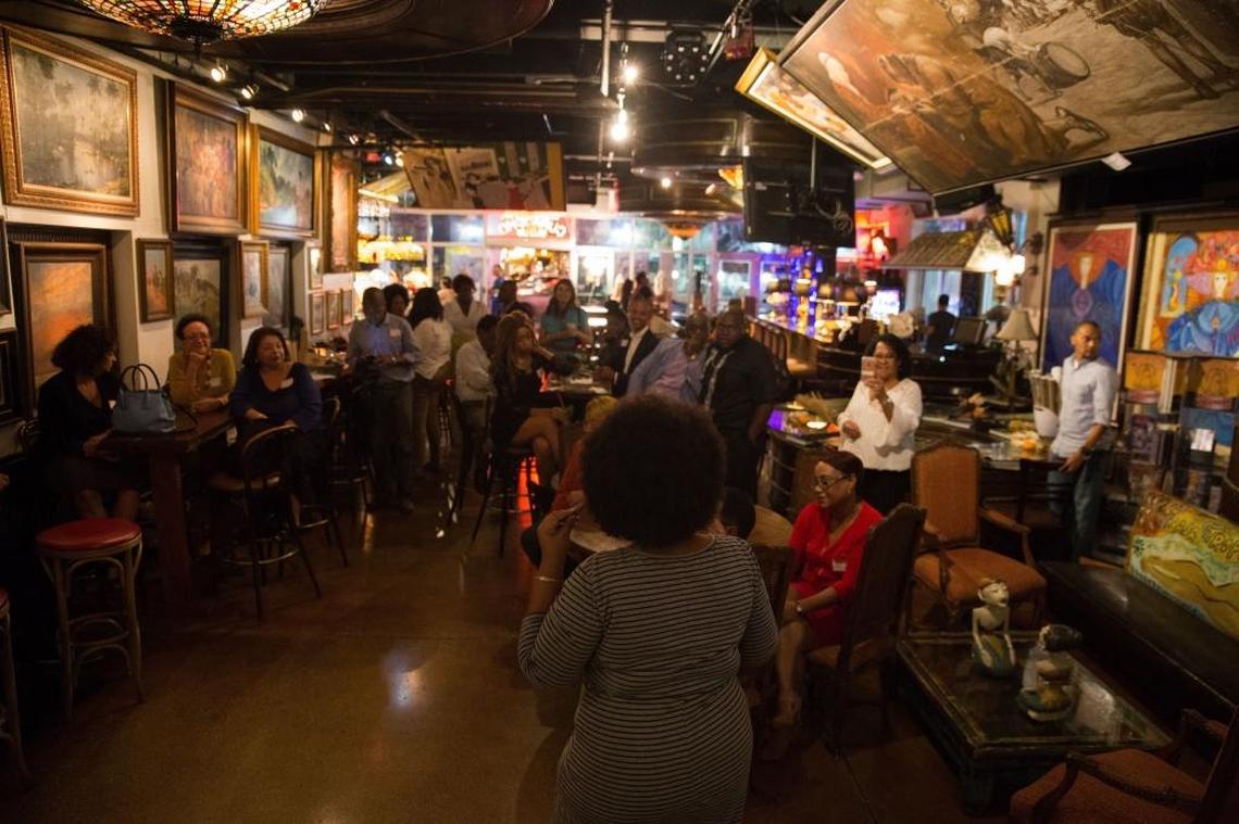 Yvette Rodríguez speaks to the guests during the first meeting of the Afro-Latino Professionals in Miami.