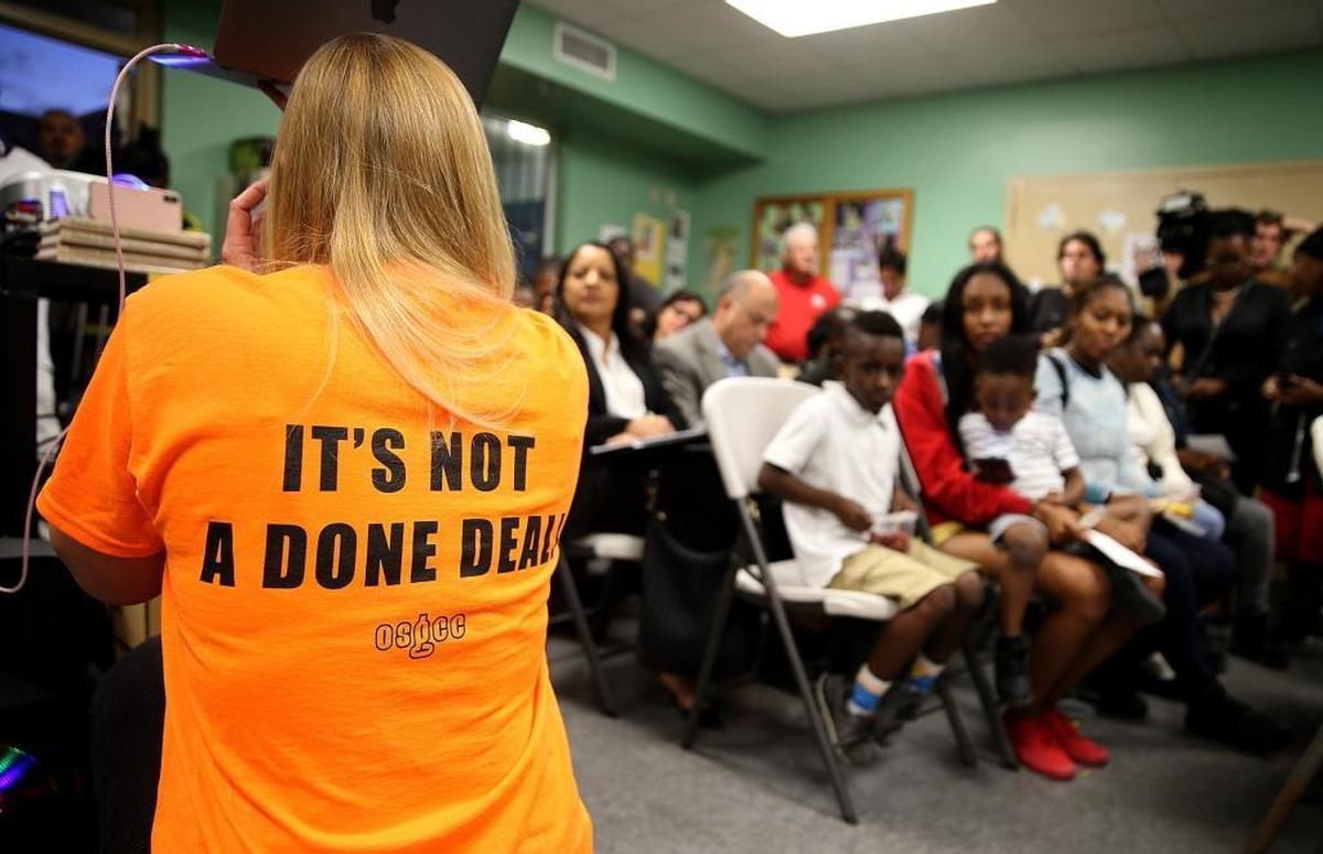 Community activists gathered during a community meeting by opponents of the David Beckham soccer stadium in Overtown at Reeves Park Community Center, Thursday, Feb. 1, 2018.
