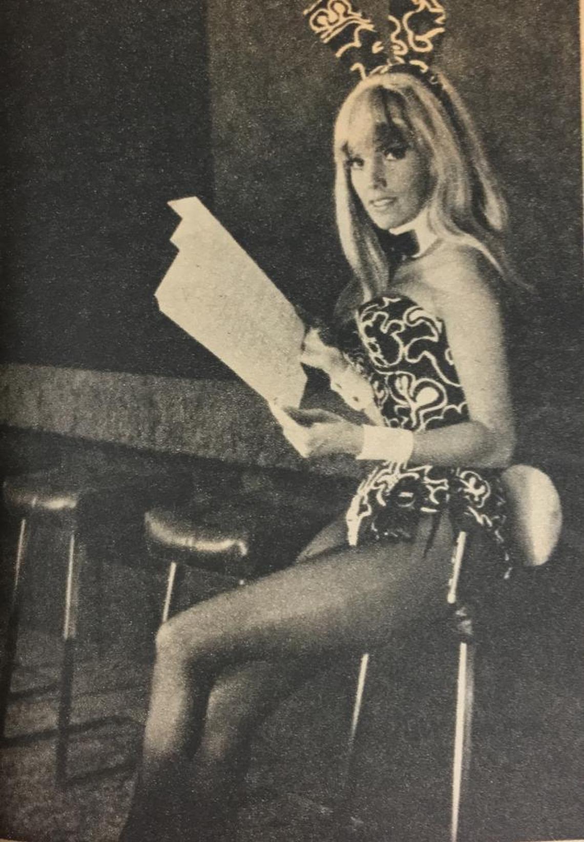 Playboy Bunny Carol Vitale poses at the bar in the Playboy Plaza’s Hugh M. Hefner Penthouse in 1971, in this photo of a photo from the Feb. 14, 1971 Miami Herald Tropic Magazine.
