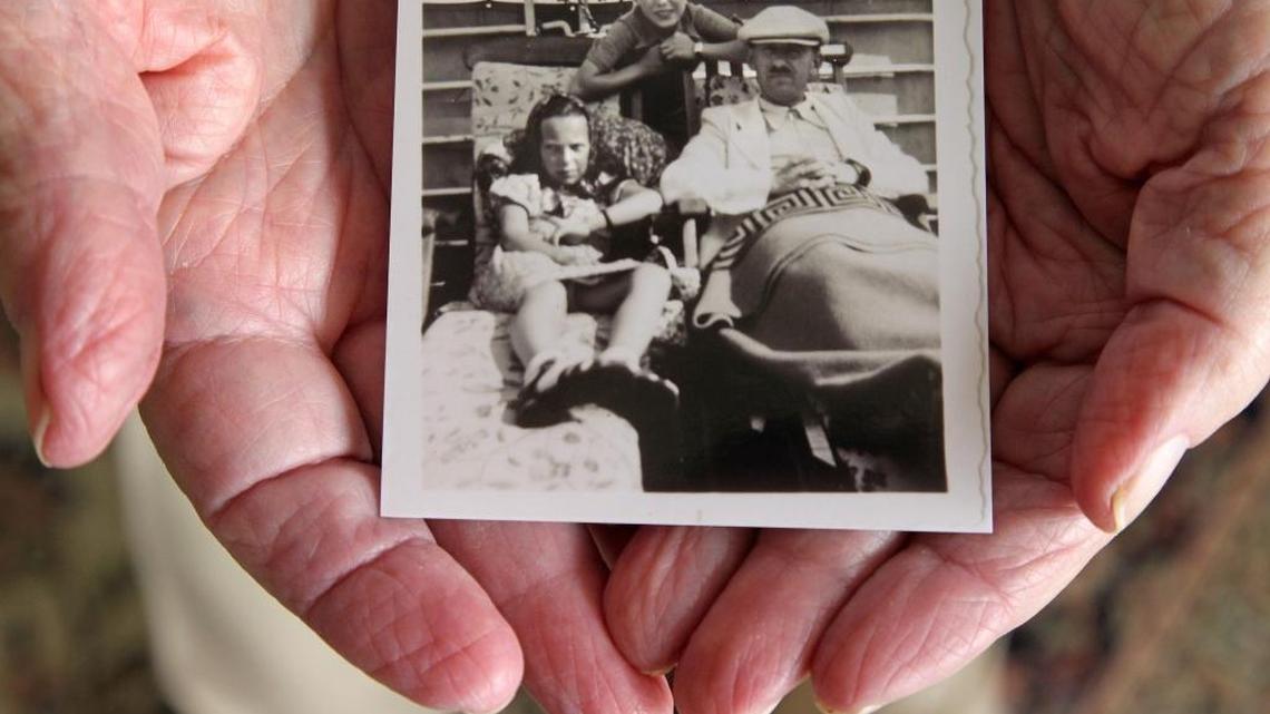 Herbert Karliner shares a photo of himself at age 12, his sister Ruth, 11, and his father, Joseph Karliner, on the SS St. Louis. Karliner was one of 900 Jewish refugees fleeing Nazi Germany during World War II who were turned away when they reached the coast of Florida.
